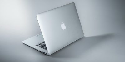 Photo by Maxim Hopman silver macbook on white table