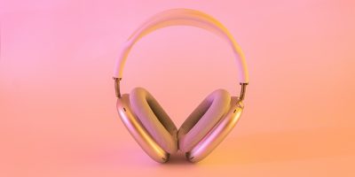 Photo by Ervo Rocks pink and white wireless headphones
